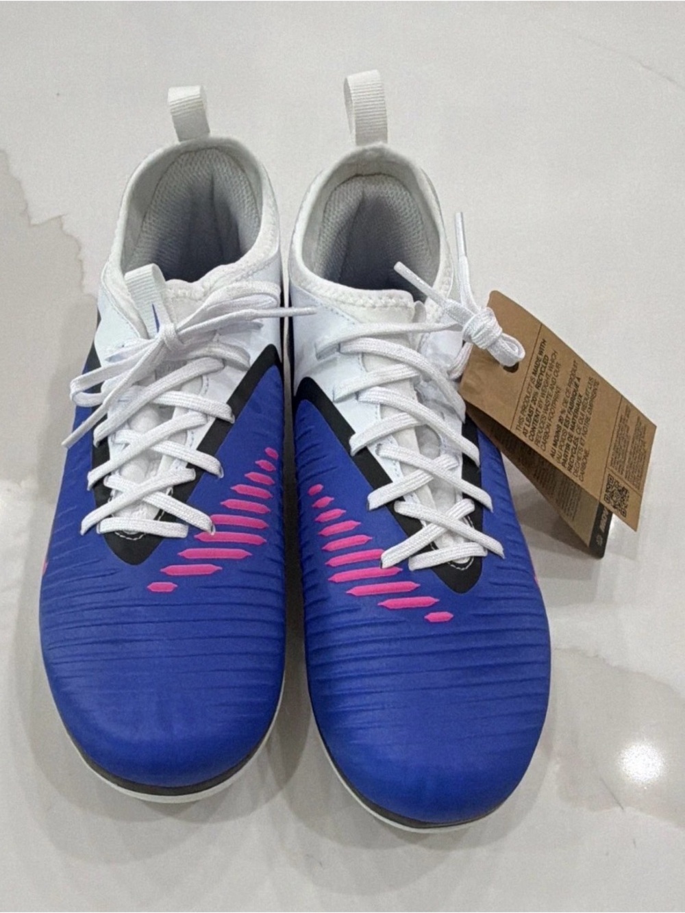 Nike Blue Soccer Shoes with Pink Accents